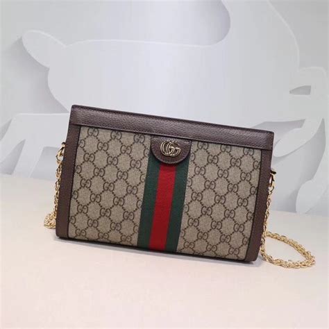 gucci clutch bag with chain|More.